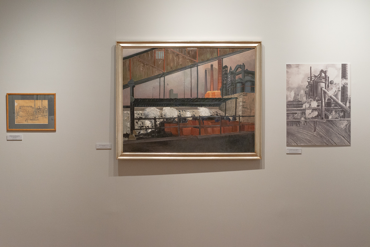 obrazy w ramach zawieszone na białej ścianie muzeum