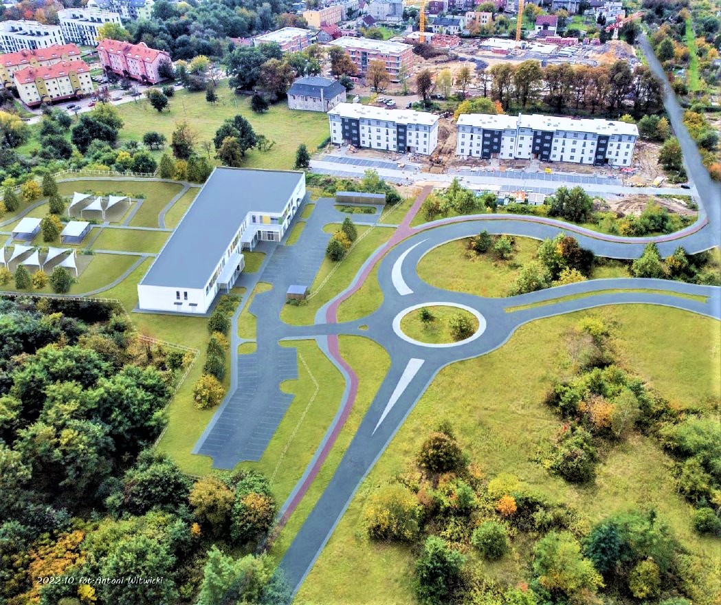 Wizualizacja poglądowa ronda przy żłobko-przedszkolu (mat. ZBM II TBS Gliwice / Ekoinbud Sp. z o.o. drogi i budynki. Ujęcie z góry. Wizualizacja