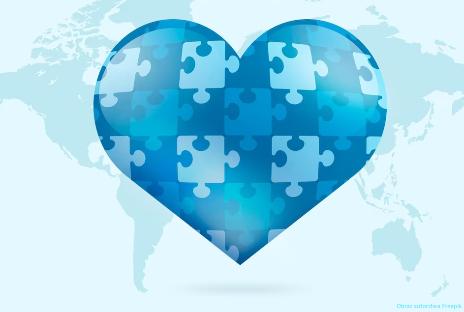 Serce złożone z wielu niebieskich puzzli na tle mapy świata